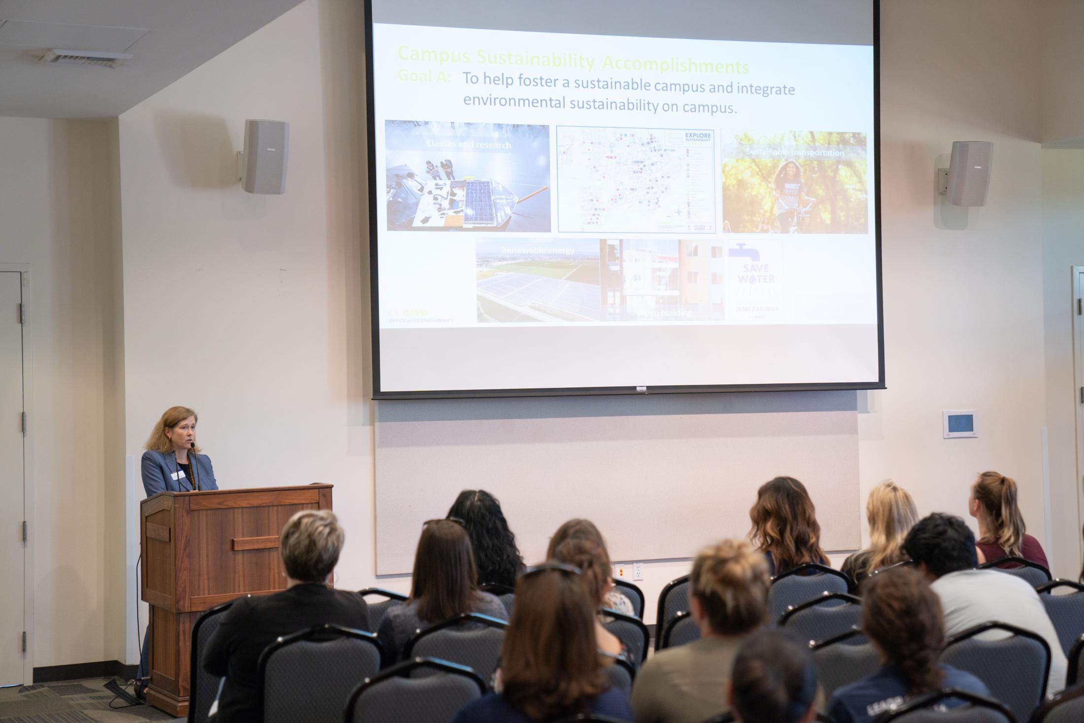 Image of Camille Kirk, director of the UC Davis Office of Sustainability, speaking at the 2019 Sustainability Summit. 