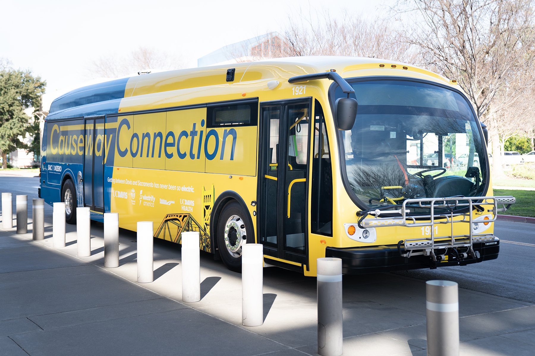 electric bus parked in front of Mondavi Center