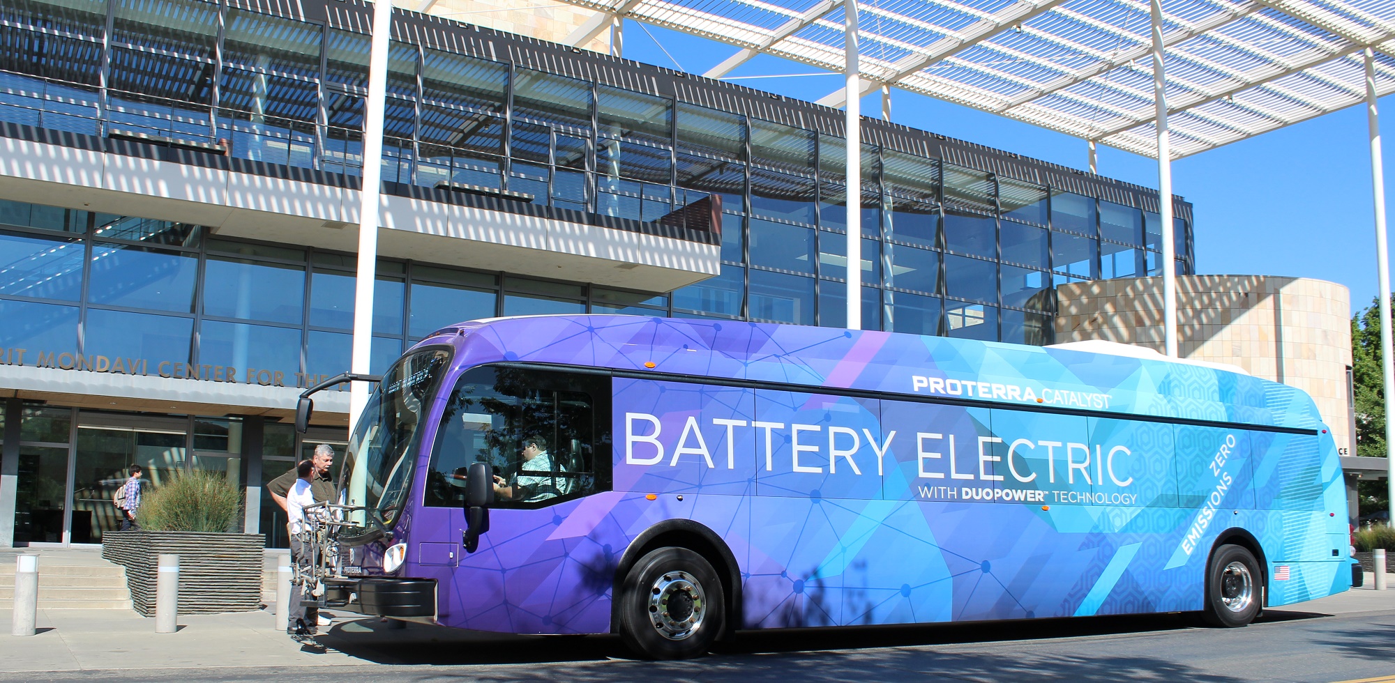 electric bus parked in front of Mondavi Center