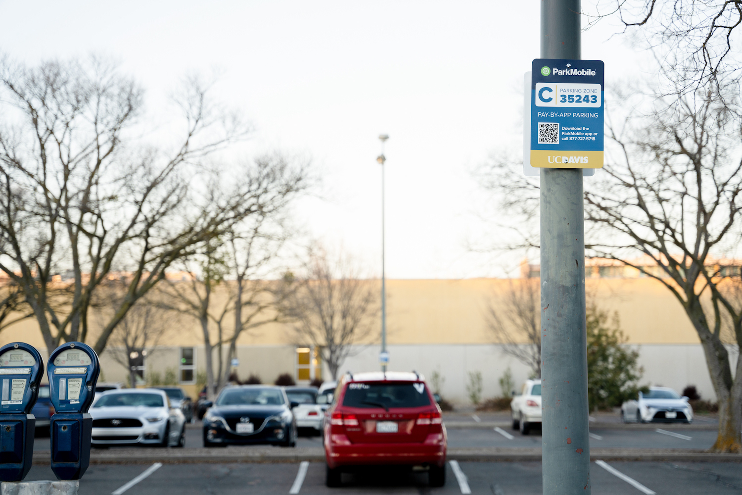ParkMobile sign in a UC Davis parking lot