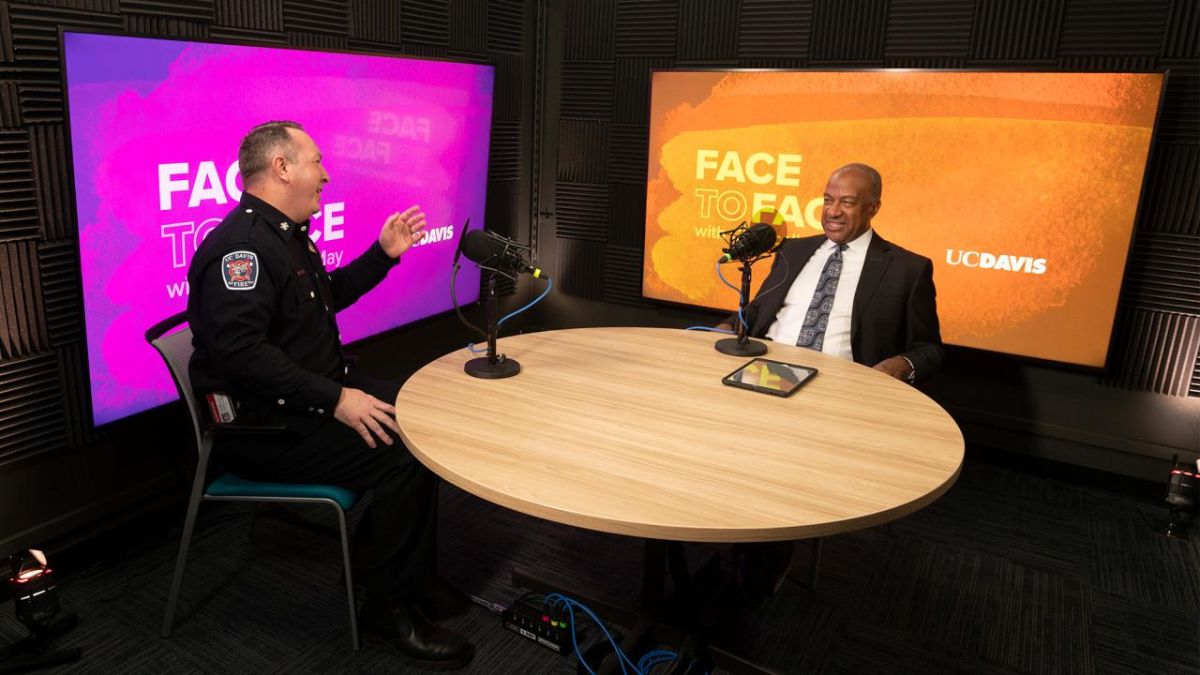 Fire Chief Nate Trauernicht and Chancellor Gary S. May talk in the Face to Face podcast studio
