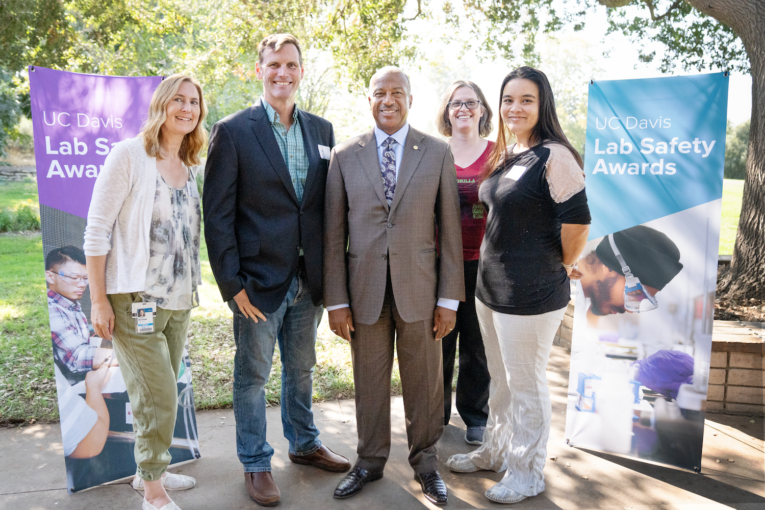Chancellor Gary S. May poses with members of the grand prize winning Bird Lab