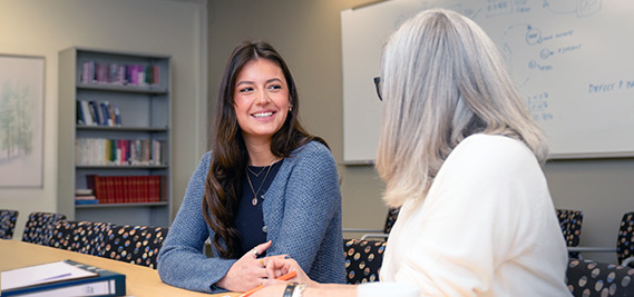 Student working with an HR professional.