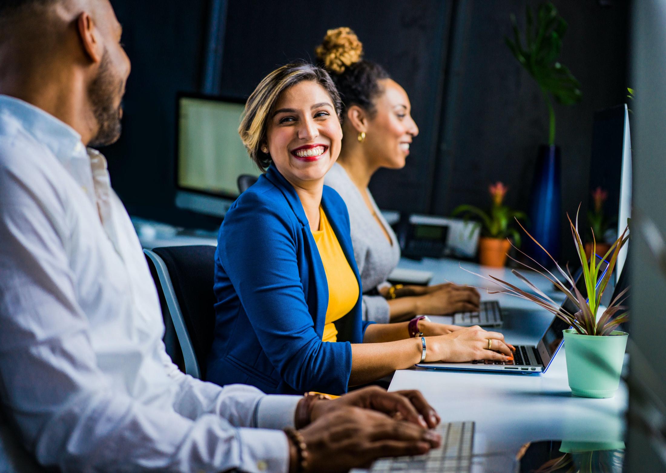 Smiling coworkers in a meeting