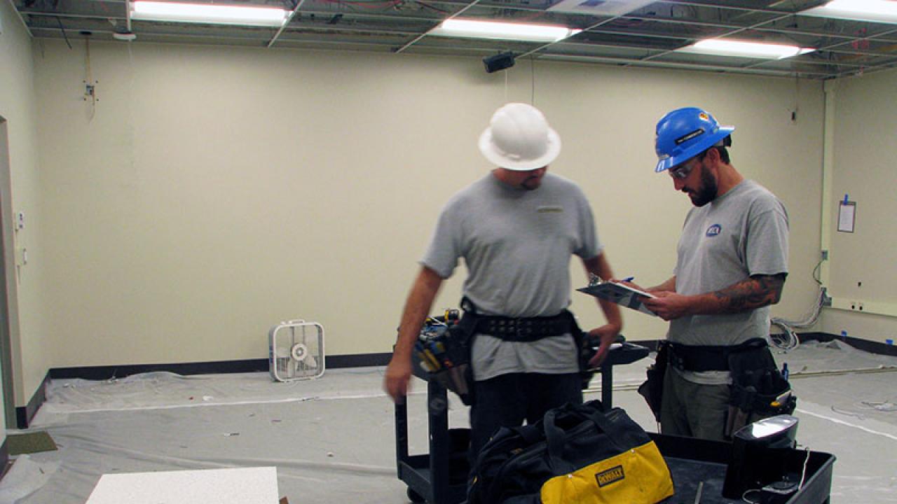 Photo of renovation workers.