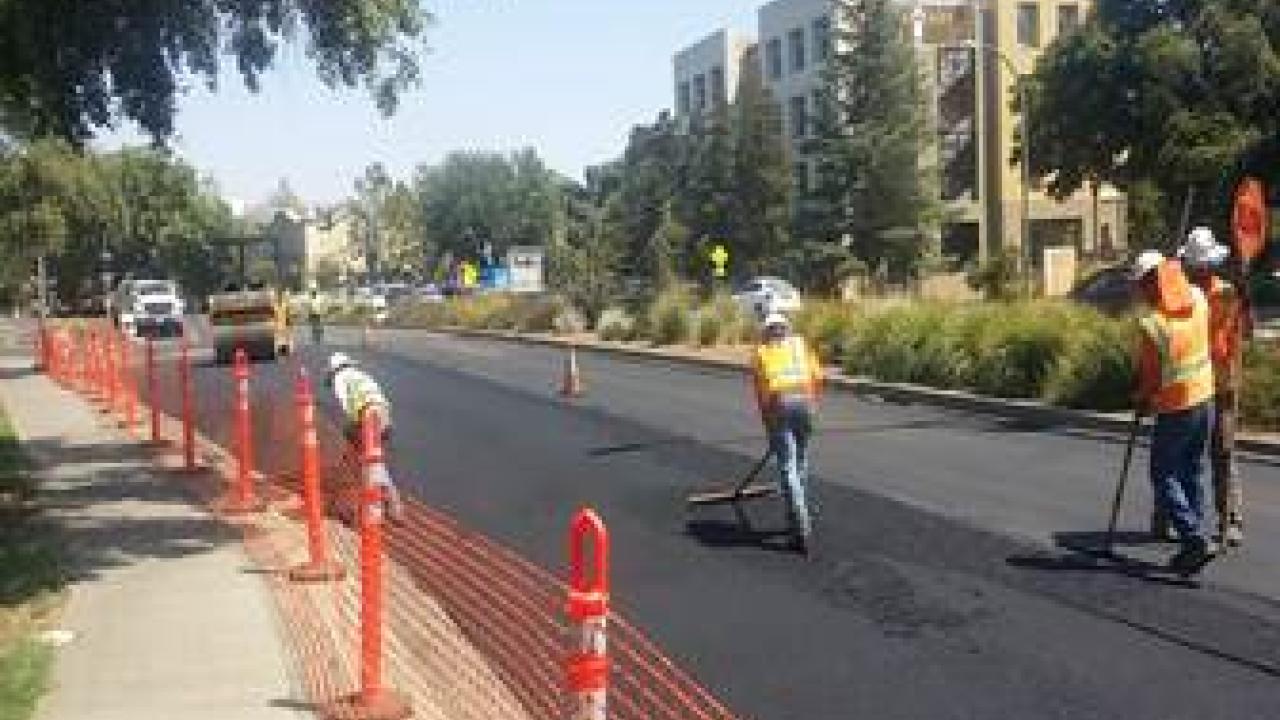 Photo of road construction workers.