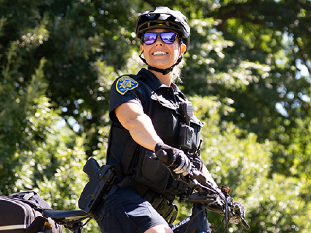 Police officer on bicycle.