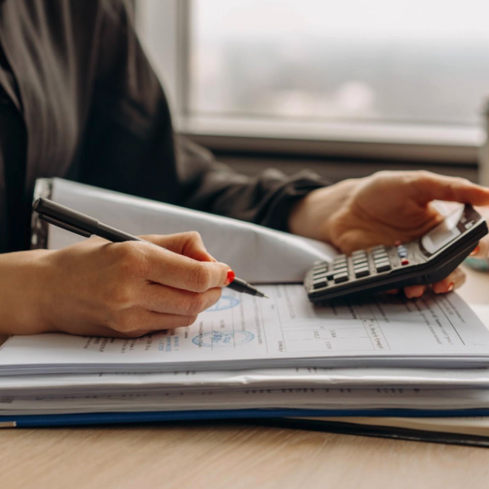 woman using calculator