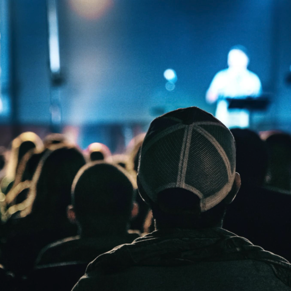 audience listening to anonymous speaker