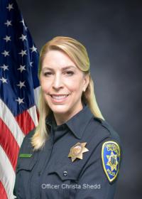 Official headshot of Christa Perparos in uniform.