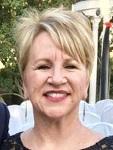 Teri smiling at camera