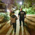 Photo of volunteers and police on lighting walk.