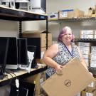 Staff member working in computer storage area