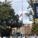 Photo of flag at half-mast outside Memorial Union.