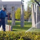 Photo of groundskeeper at work.