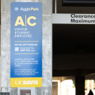 photo of parking signage at entrance to Pavilion structure. 