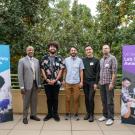Chancellor May poses with four members of the Takamura Lab at the 2025 Lab Safety Awards