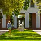 people walking in front of mrak hall