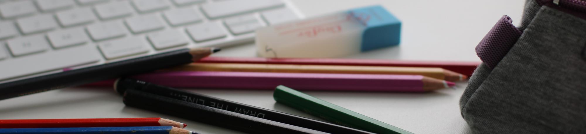 keyboard and pencils